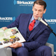 John Cena reading a book that is not Oh, The Places You’ll Go.
